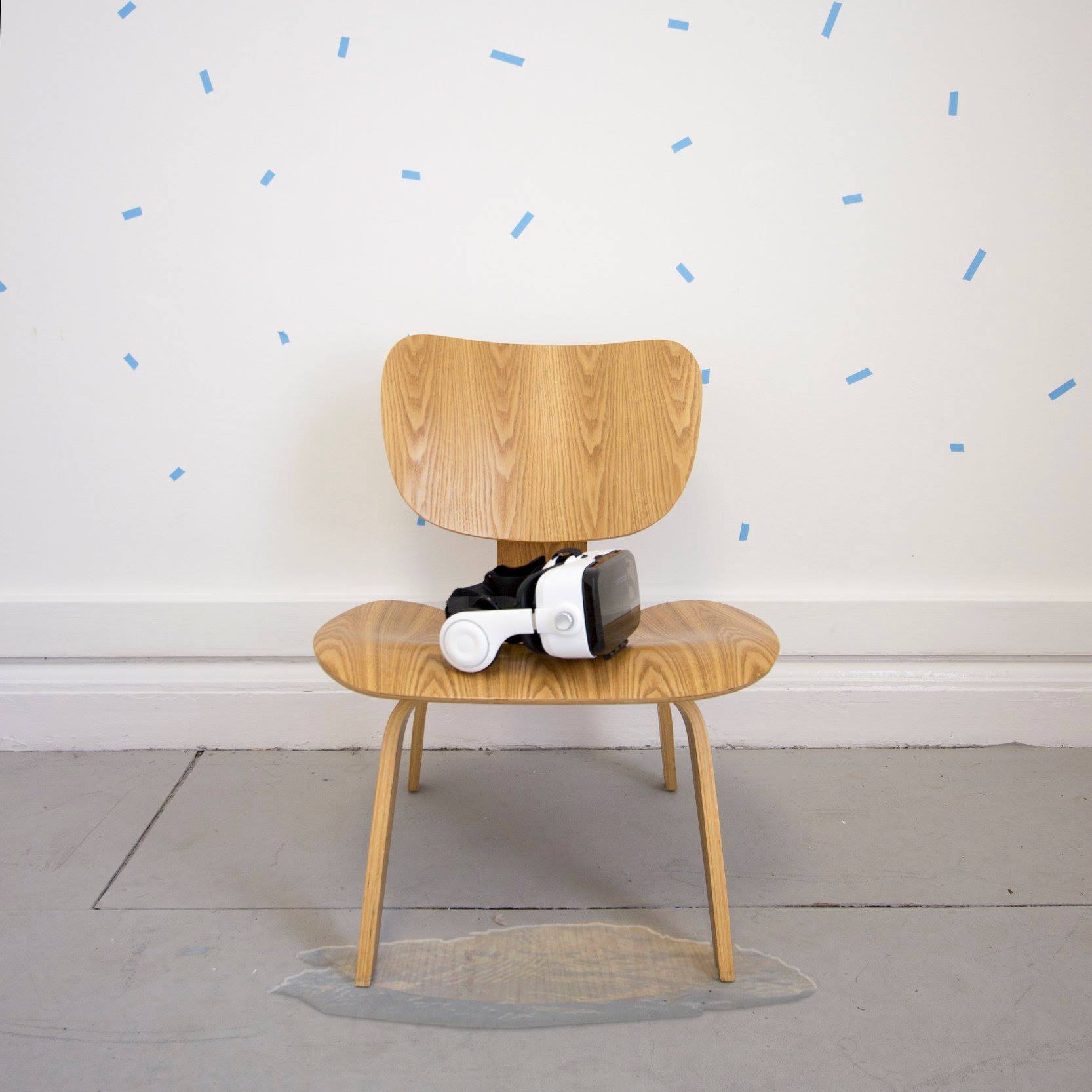 Installation view — VR headset on chair